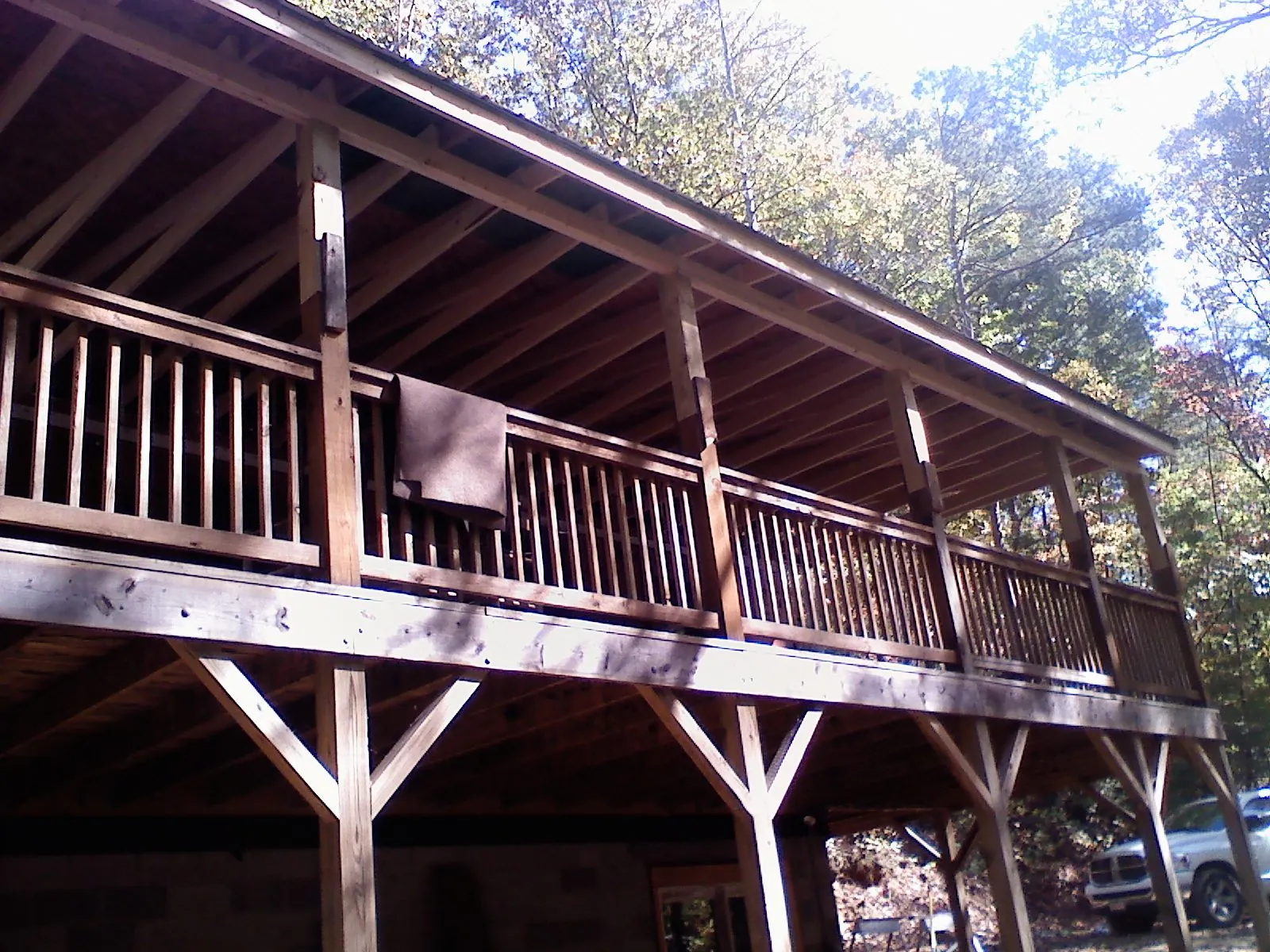 Timber framing under a new elevated porch and deck — Roof Leak Repair in Venus by Roofing Brothers